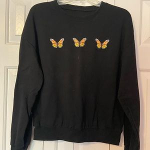 Women’s black crew neck